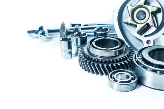 Assorted mechanical components arranged on a light background highlighting their intricate design and functionality photo