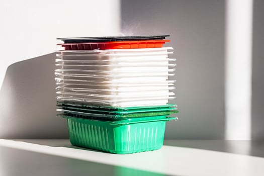 Pile of disposable plastic food containers ready for sorting photo
