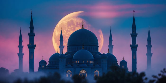 Majestic mosque silhouette against a large moonrise in a twilight sky photo