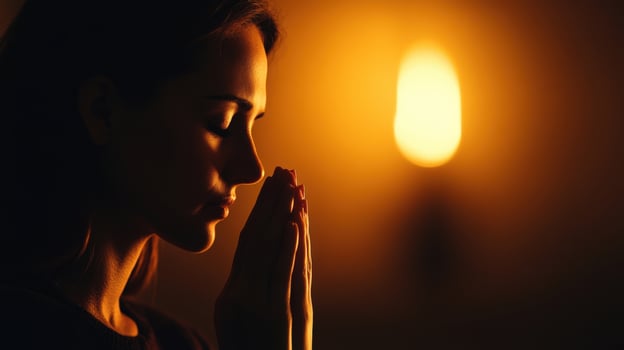 Devout Praying Christian Woman, In Humble Reverence To God. With Hands Folded She Looks Upwards Before Closing Eyes. Seeking Guidance and Strength to Live a Life in Accordance with The Bible photo