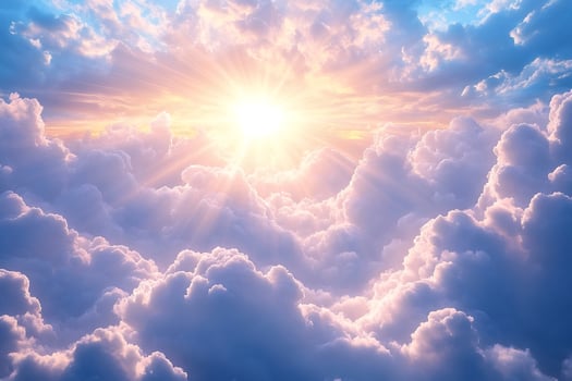 Sun shining through beautiful clouds in blue sky photo