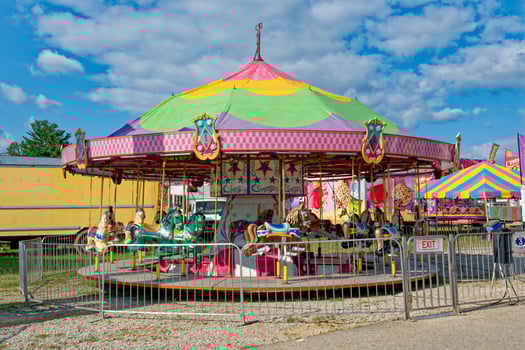 Colorful carousel at the fair photo