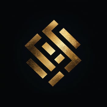 Golden geometric abstract design with a textured surface on black photo