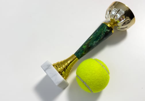 tennis trophy, champion award cup, first place winner of a sports tournament photo