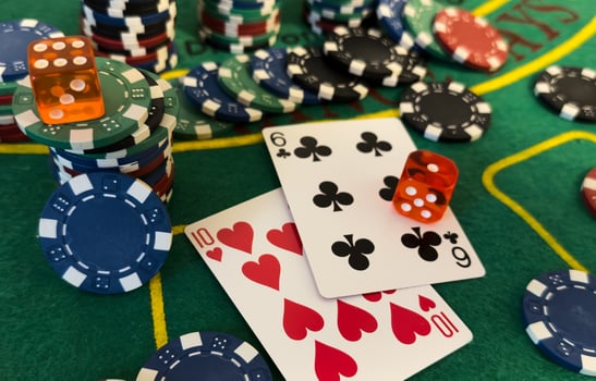 Chips are colored for poker and playing cards on the poker table before the game. poker. casino. win. isolated photo