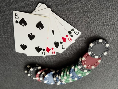Chips are colored for poker and playing cards on the poker table. poker. casino. win. photo