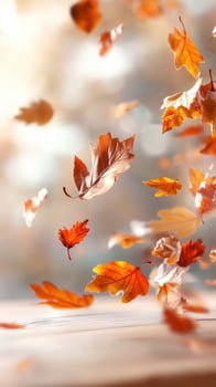 Golden autumn leaves gracefully descend against a backdrop of warm sunlight, creating a serene and enchanting seasonal atmosphere. photo