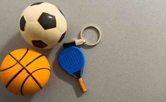Keychain with a soccer ball, padel racket photo
