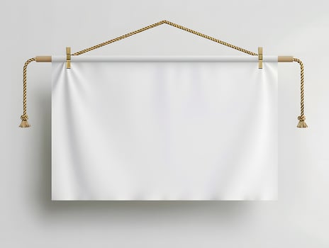 Blank white banner hanging on a rope photo