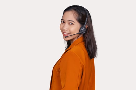 Young Girl Customer Service Representative Agent Smiling Isolated On White Background photo