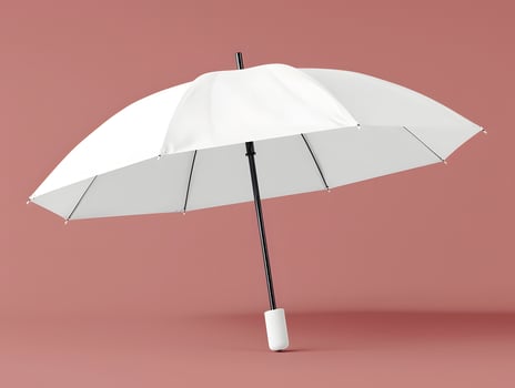 An open white umbrella on a pink background photo