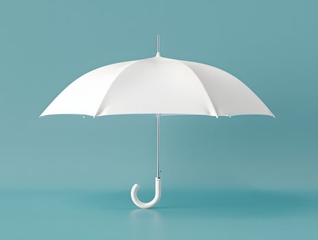 An umbrella is shown on a blue background photo