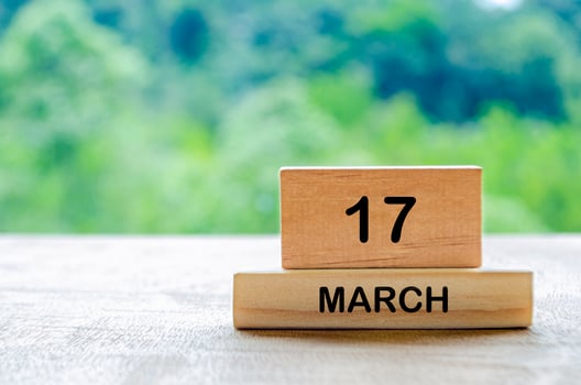 17 March calendar on wooden table with customizable space for text, ideas or messages. Calendar and copy space concept photo