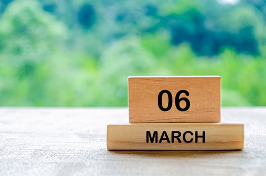 6 March calendar on wooden table with customizable space for text, ideas or messages. Calendar and copy space concept photo
