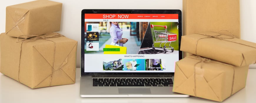 laptop computer with postal parcel, Selling online ideas concept photo