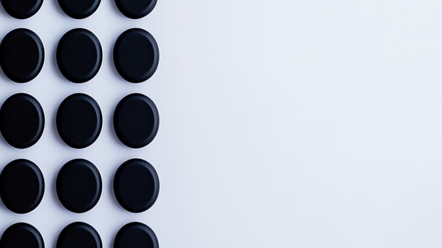 A black and white background with many black and white circles photo