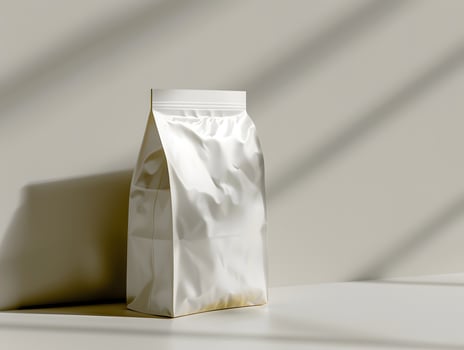 A white bag sitting on a table with sunlight photo