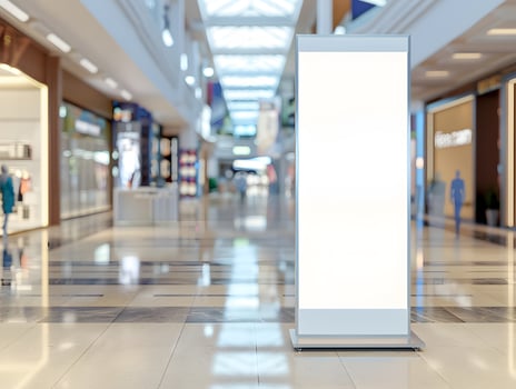 A white blank sign stands in a mall photo