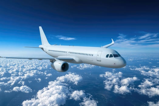 Commercial airplane flying above the clouds. photo