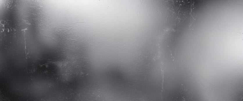 Modern and industrial aesthetic created by a subtle grunge texture on a metallic silver gradient background photo