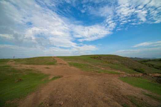 The meadows are barren and the sky is blue photo