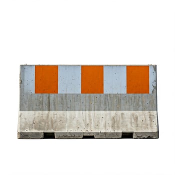 A concrete barrier with orange and white stripes photo