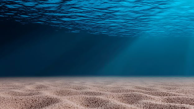 Underwater ocean floor with sand and water photo