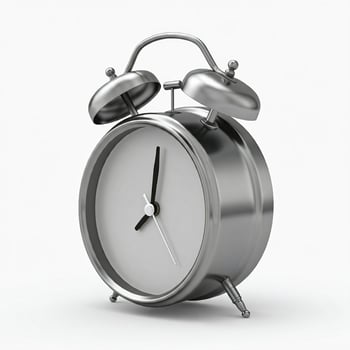 A silver alarm clock on a white background. photo
