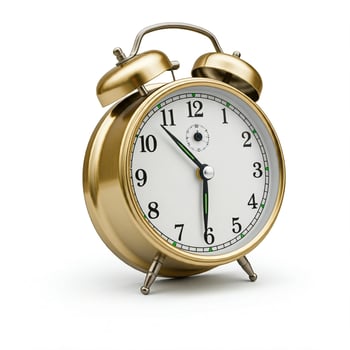 Gold alarm clock on white background photo