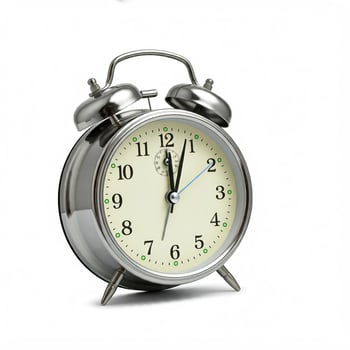 A silver alarm clock, on a white background photo