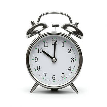 A silver alarm clock. on a white background photo