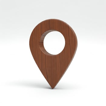 A wooden map pointer on a white background photo
