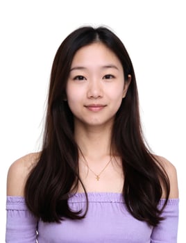A young asian woman in a purple top photo