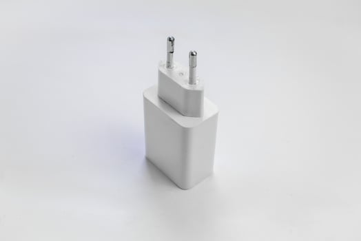 White Charger Adapter Isolated on White Background photo