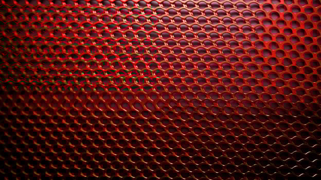 perforated metal background red photo