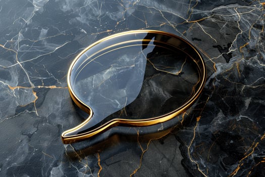 Luxurious Gold Outlined Speech Bubble on Dark Marble - Upscale Branding Design for High-End Advertising photo