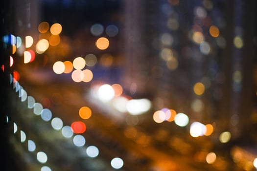 A blurry image of lights in the city at night photo
