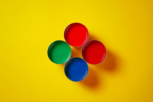 Open Paint Cans with Primary Colors photo
