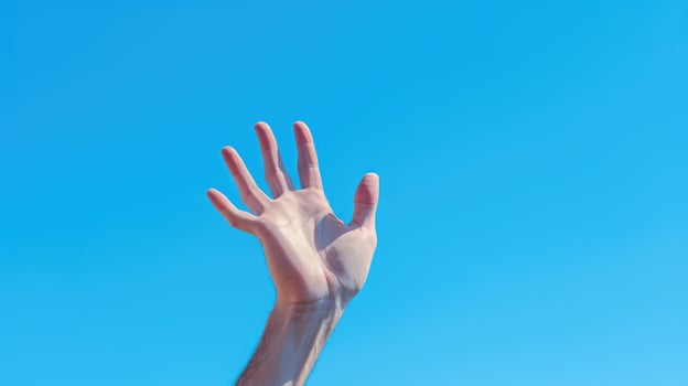 uplifting hand blue photo