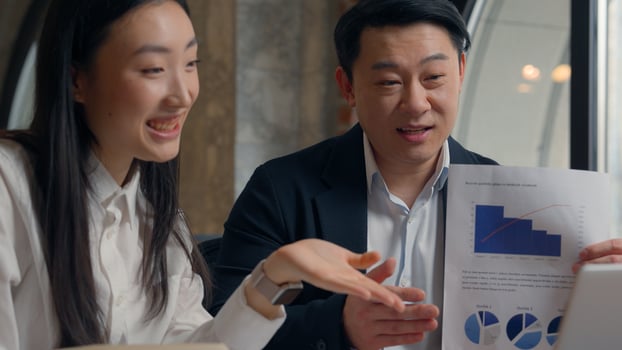 Asian financial marketing workers coworkers colleagues business presentation statistic data Korean Japanese woman girl female businesswoman with Chinese male guy man businessman talk call office photo