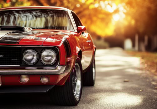 Classic Red Muscle Car In Autumn Sunlight photo