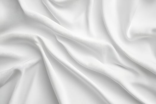 White satin fabric forming gentle waves, luxurious and elegant background photo