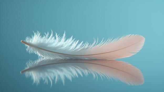 Soft white feather resting on calm blue surface reflecting gentle light. photo