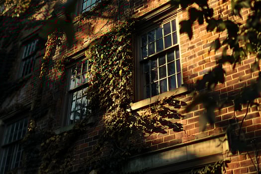 A clock on a brick building photo