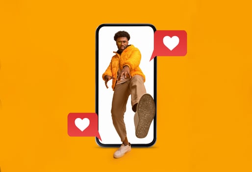 A person interacts with a smartphone, showcasing messages of love and connection. Bright colors enhance the theme of romance and technology, perfect for Valentine's Day celebrations. photo