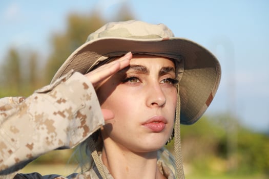 Female Soldier Defends with Pride and Honor photo