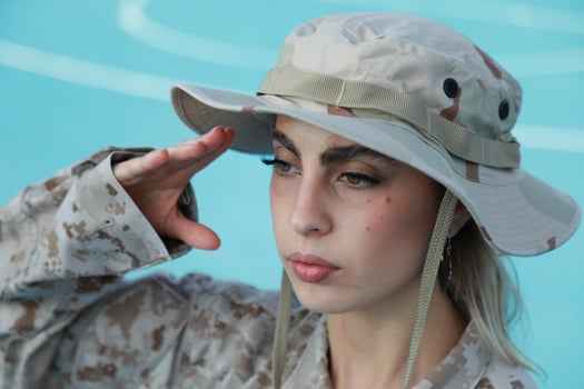Woman Soldier Stands Guard with Confidence photo