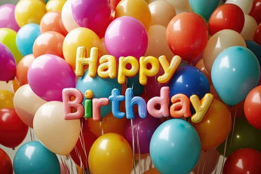 Colorful balloons wishing happy birthday with inflatable letters photo