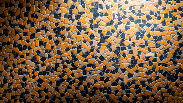 Colorful mosaic pattern featuring various shapes and textures, ideal for design backgrounds photo