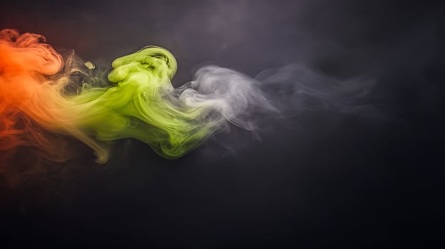 Colorful smoke swirling against a dark background, creating an abstract artistic effect photo